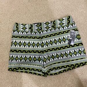 New with tag. Inc. shorts size 10. Fun pattern in white black and green.